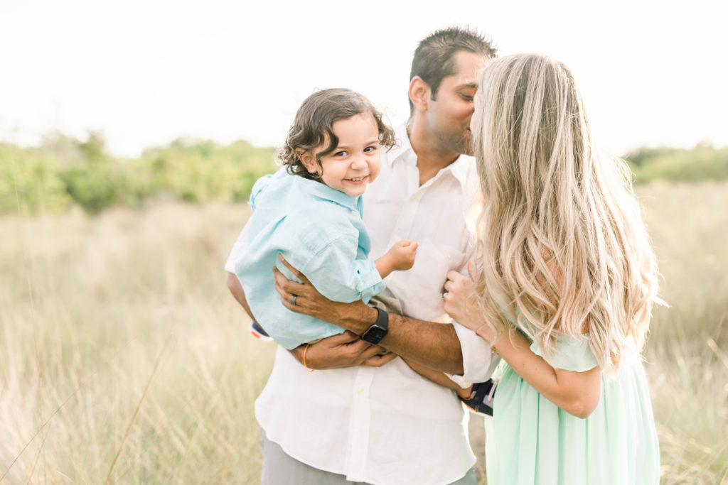Family Pictures With Young Kids at Sunset by Jommy Photography. Family picture experience relaxed fun photo session outdoor location sunset Cypress Point Park Tampa family photographer Jommy Photography summer family picture outfits #floridaphotographer #jommyphotography #tampafamilyphotography #cypresspointpark #familyphotography #photographingtoddlers #outdoorfamilysession #candidfamilyphotos #goldenhourphotography #idealclients #familysession