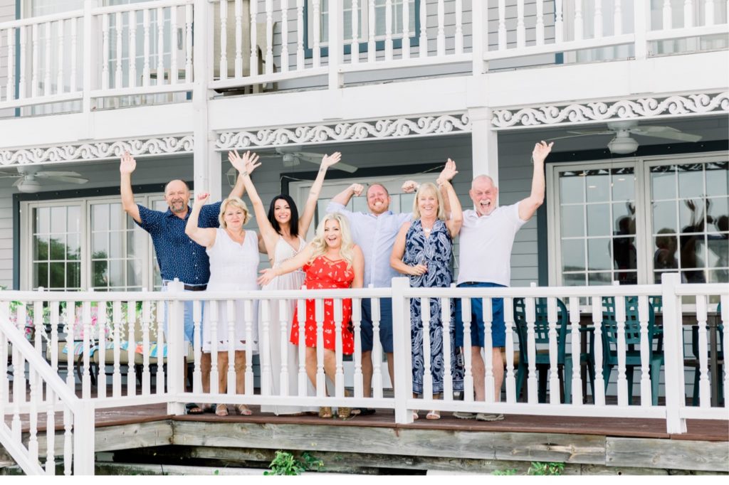 Friends and family gathered to help this groom pop the questions to his gorgeous girlfriend on the Clearwater beach in Florida. #surpriseproposal #4thofjuly #independencedayengagement #familyandfriends #floridabeach #beachproposal #proposaldetails #proposal #marryme #shesaidyes #redwhiteandblueproposal