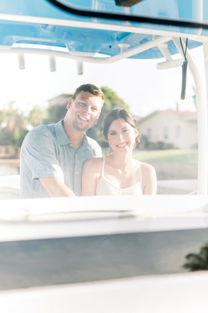 Bride and groom on the boat for wedding photo in clearwater.