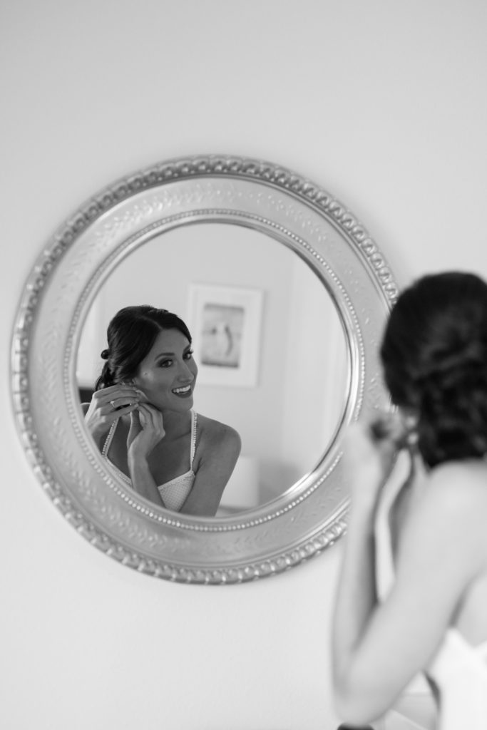Bride getting ready in the getting ready room clearwater