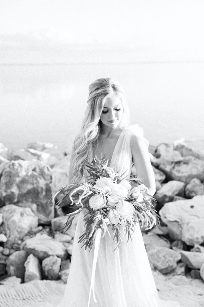 Bride photos standing by the beach at the Current hotel Tampa.