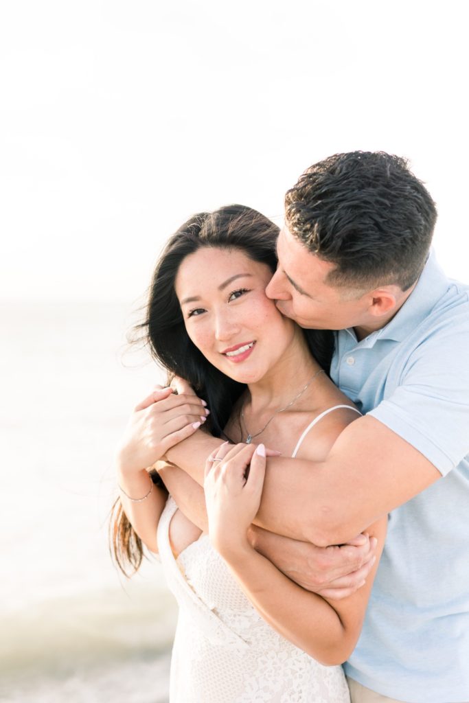 Model look from the future bride on her engagement beach photos.