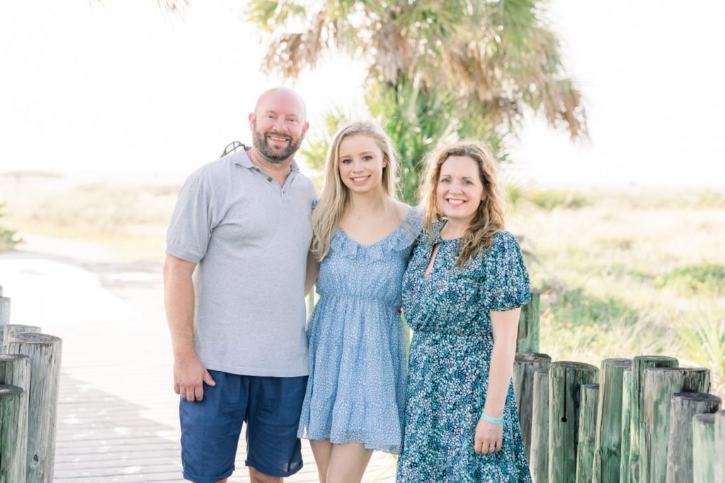 Senior with her family photo.