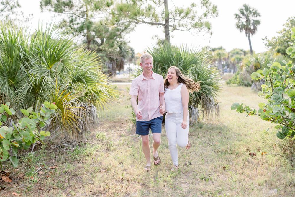 Reasons why doing a couples photoshoot is worth it by Jommy Photography. couple holding hands laughing #JommyPhotography #JommyCouples #FloridaCouplesPhotography #ProfessionalPhotographer #beachphotographer #couples #romanticcouples