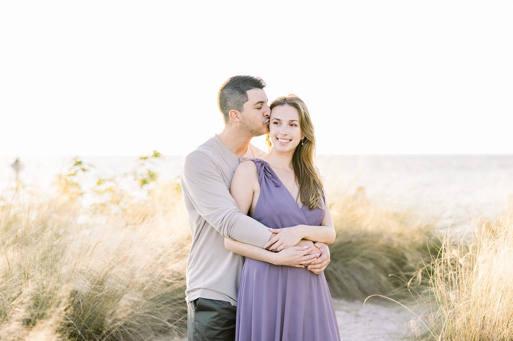 Florida sunset beach engagement portraits by Jommy Photography. what to wear engagements #JommyPhotography #JommyEngagements #BeachEngagements #FloridaEngagements #FloridaBeachEngagements #ClearwaterFlorida #EngagementPhotographer
